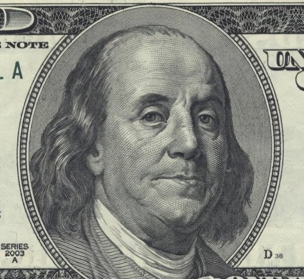 美元100元头像是谁