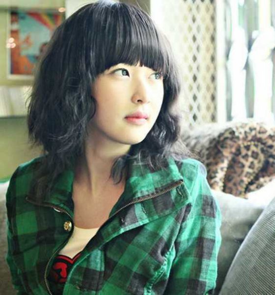 长脸型女生适合的短卷发推荐