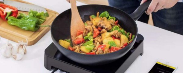 电磁炉在炒菜时能掂锅翻锅吗