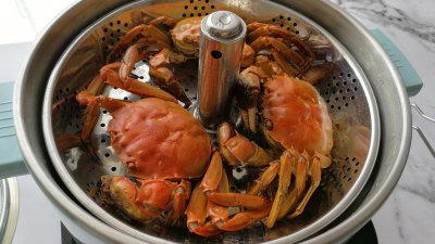 冷冻螃蟹蒸多久可以吃 螃蟹蒸过后放冰箱多久可以吃