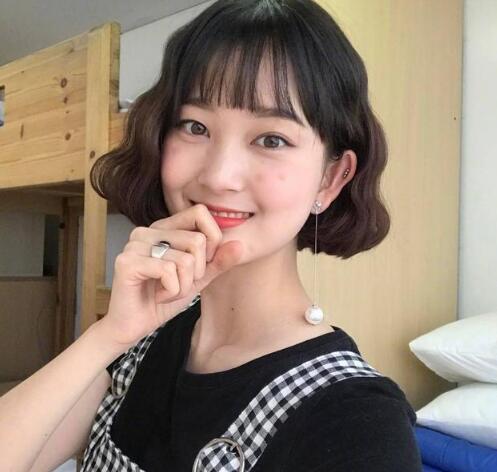 长发蛋卷头发型图片